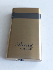 Zico/Broad  jet  lighter gas refillable slimline  gold and grey with 18ml purifi