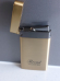 Zico/Broad  jet  lighter gas refillable slimline  gold and grey with 18ml purifi